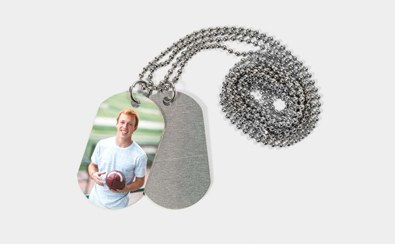 One Dog Tag featuring a picture of teen boy. 