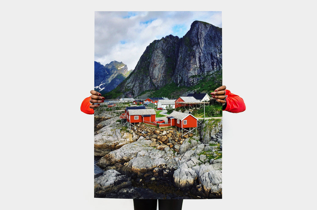 Woman holding a 30x40" Photo Print featuring a picture of a landscape.