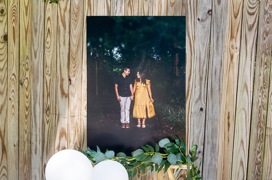 20x30" Photo Print mounted on a Single Weight Matboard, set up on an easel outdoors. Print features an engagement photo. 