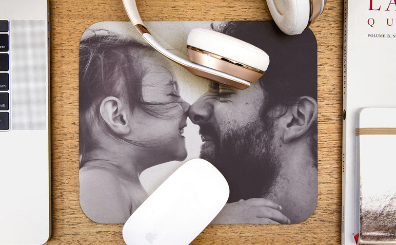 Mouse Pad featuring a photo of a father and his daughter. 