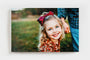 Single Lustre Photo Print featuring a photo of a young, blond girl.