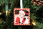 Baby boy dressed in a Santa Costume on a Custom Cube Ornament hanging on a Christmas Tree