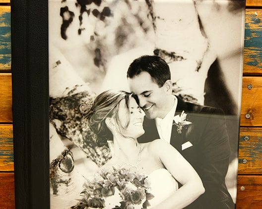 Couple who just got married on the cover of a acrylic photo album