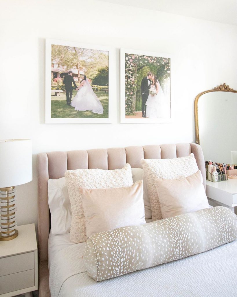 framed wedding photos in bedroom