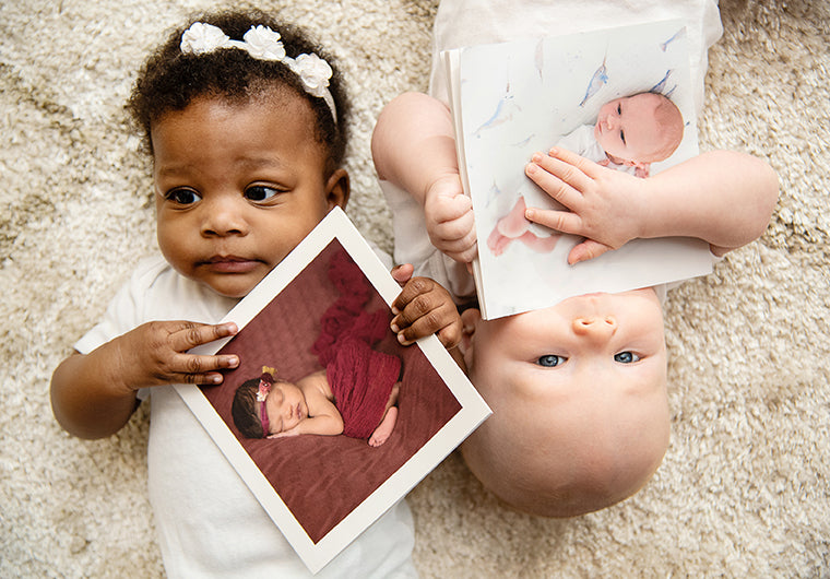 babies with photo books