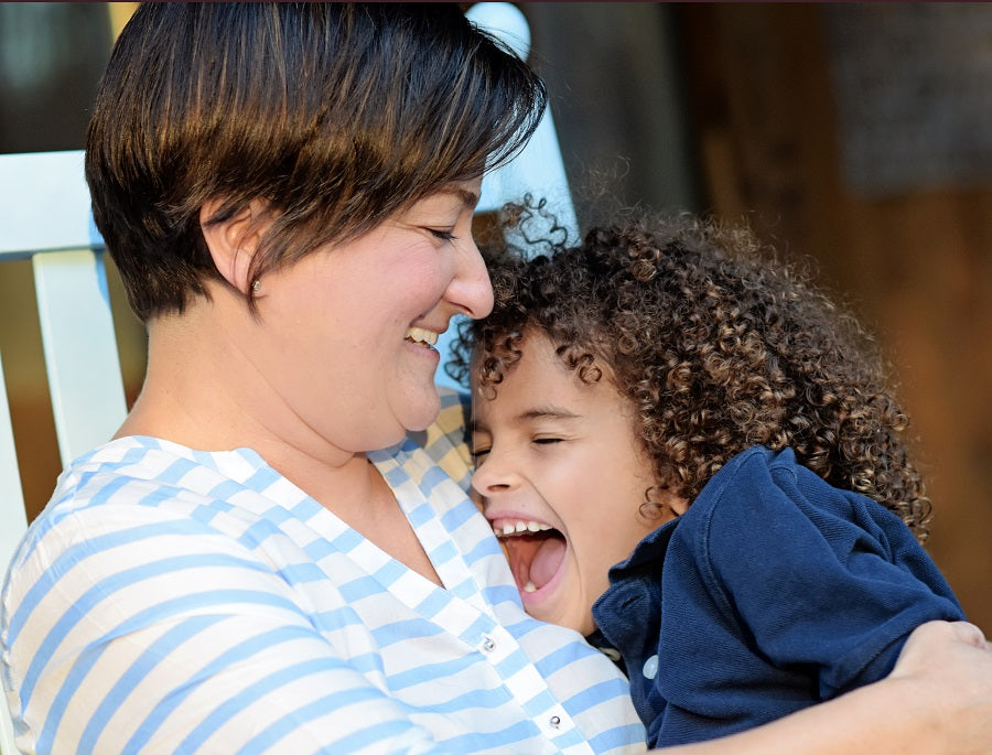 Mom and son smiling