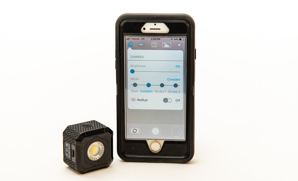 Lume Cube AIR next to iPhone