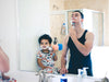 Dad and son shaving