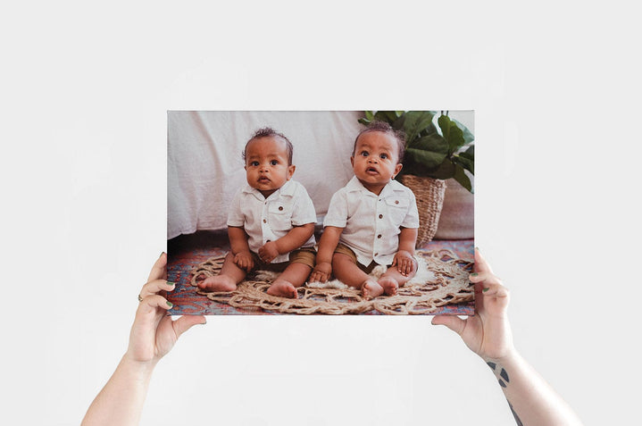 12x18" Landscape Canvas Print featuring a photo of twin babies
