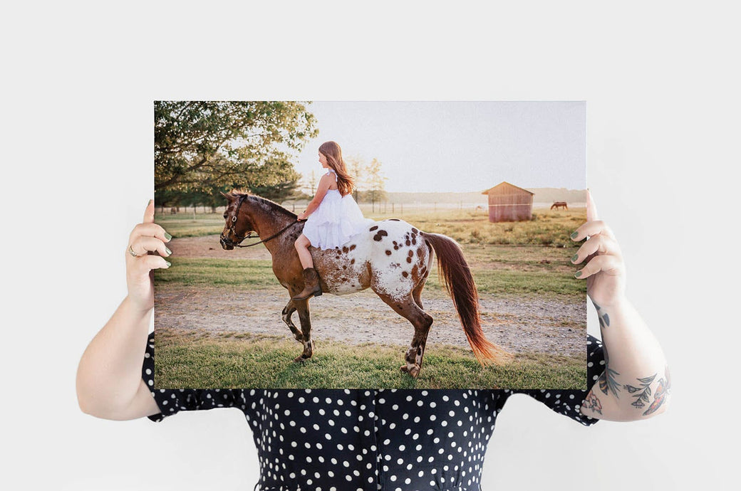 16x24" Landscape Canvas Print featuring a photo of a girl riding a horse