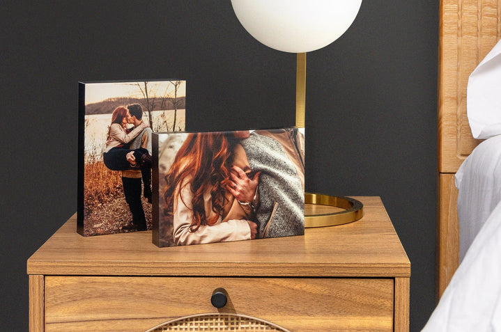 Two 5x7" Gallery Blocks on a bedside table featuring autumnal images from an engagement shoot - Nations Photo Lab