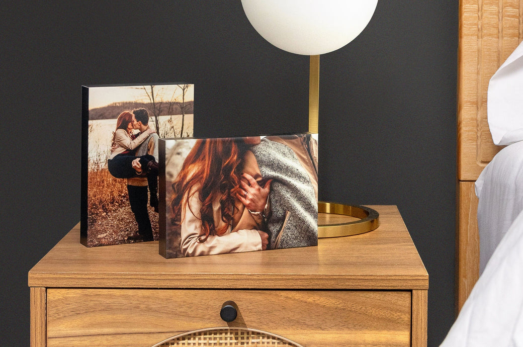 Two 5x7" Gallery Blocks on a bedside table featuring autumnal images from an engagement shoot - Nations Photo Lab