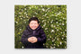 16x20" Gallery Block featuring a photo of a child on a field of flowers - Nations Photo Lab