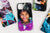 Flat lay of four Custom Photo Phone Cases, the main Phone Case feature a picture of a young girl. 