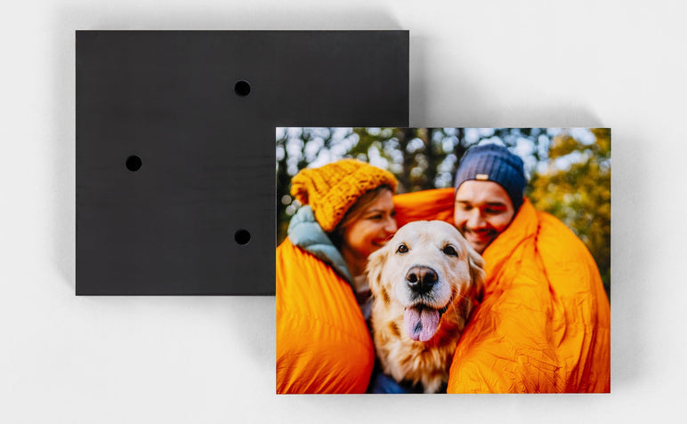 Lay flat image of the front and back of a Standout Mounted Print, which come with four holes on the back, making Standouts ready to hang out of the box.