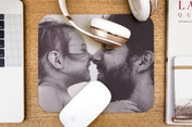 Mouse Pad featuring a photo of a father and his daughter. 