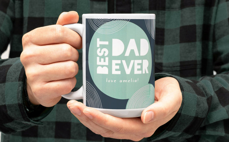 Man holding a 15 oz. Photo Mug with the artwork 'Best Dad Ever'