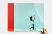 Large Pearl Photo Print featuring a picture of a woman and child in front of a blue wall.