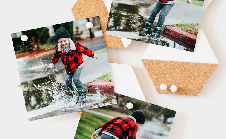 Three square Photo Prints featuring photos of a child splashing around in rain puddles.