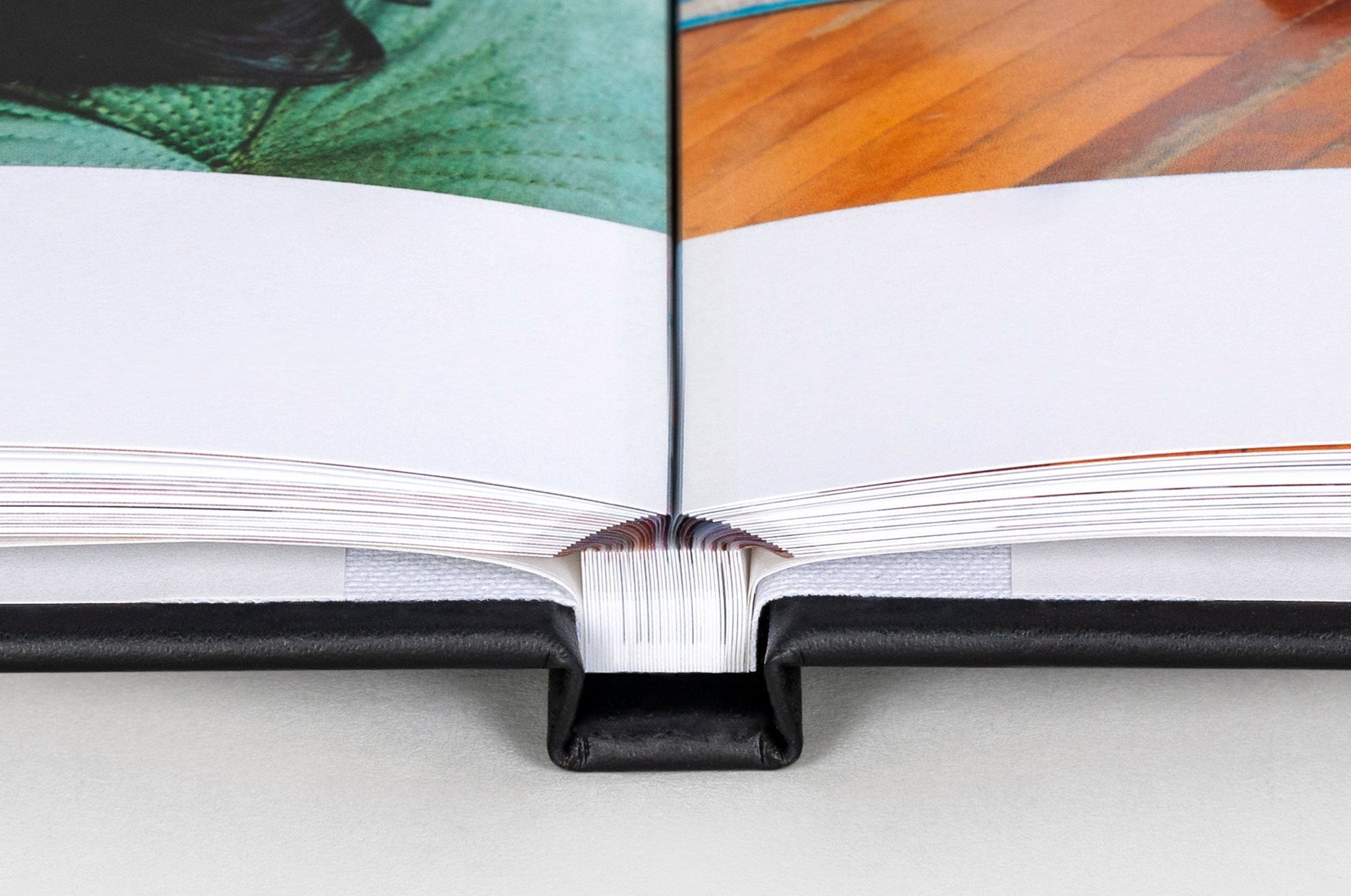 Lay Flat Photo Book binding detail shot. Lay Flat pages are designed to allow Photo book pages to lay flat. 