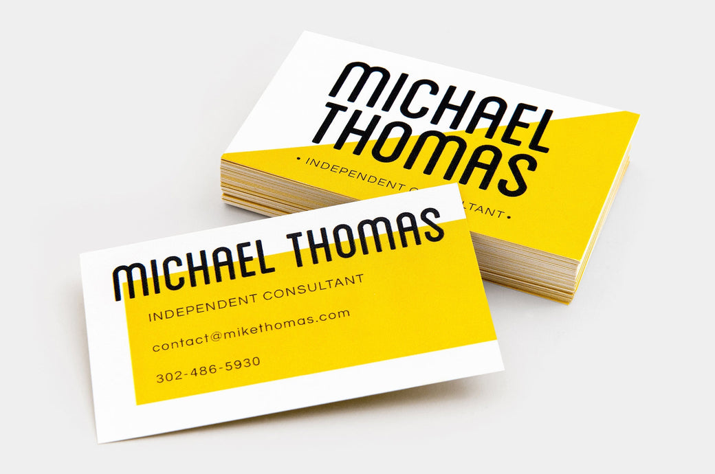 Stack of 2x3.5" Custom Business Cards.