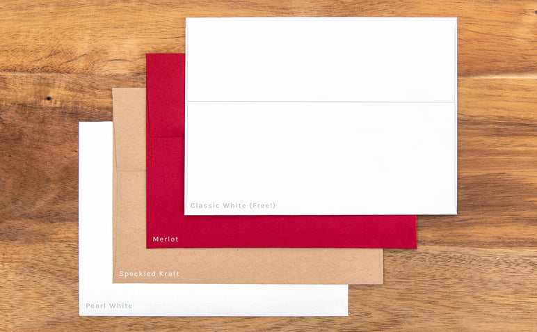 Four envelope options available: Classic White (which comes free with each pack), Merlot, Speckled Kraft, and Pearl White.