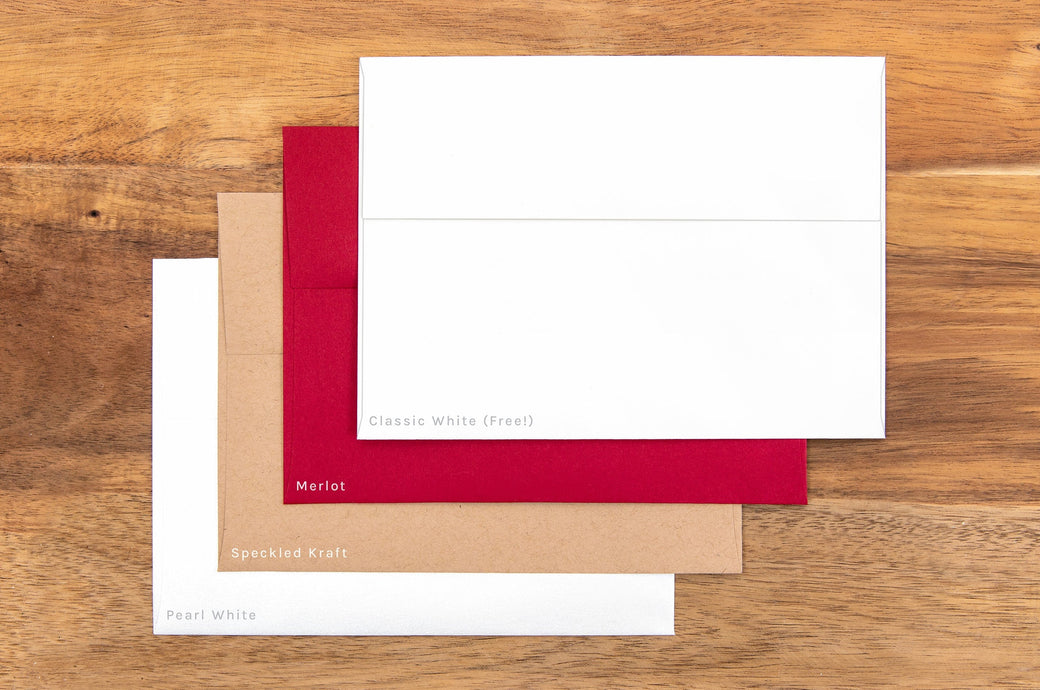 Four envelope options available: Classic White (which comes free with each pack), Merlot, Speckled Kraft, and Pearl White.