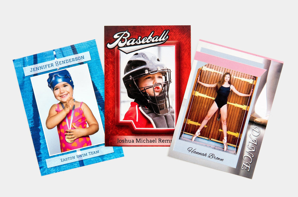 Three Trader Cards featuring pictures of young athletes. 