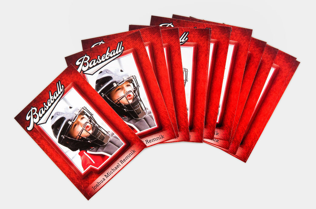 Set of Trader Cards featuring a picture of a young boy in baseball gear. 