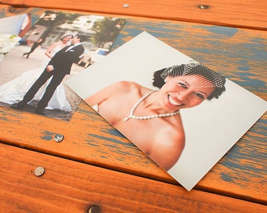 pictures of the smiling bride and another with her groom on a 3.5 x 5 custom photo print