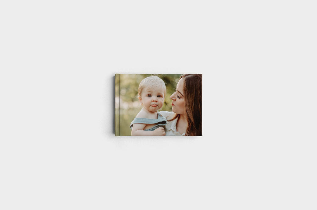 5x7" Landscape Lustre Photo Cover Photo Book featuring a photo of a woman with her baby.