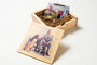 Two men in suits with their dogs on the cover of a custom Wooden USB Box