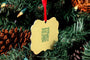 The back of a Custom Metal Ornament hanging on a Christmas Tree