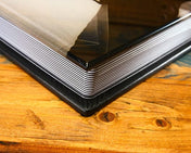 Corner of a custom acrylic cover album